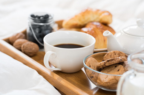 bigstock-Breakfast-in-bed-with-hot-coff-125868122
